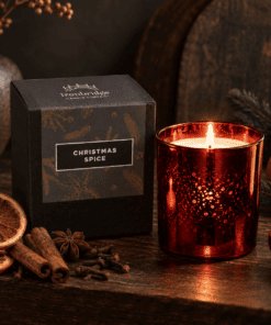 Christmas Spice Luxury Candle in ruby electroplated glass with branded box, dried orange, cinnamon, cloves and star anise.