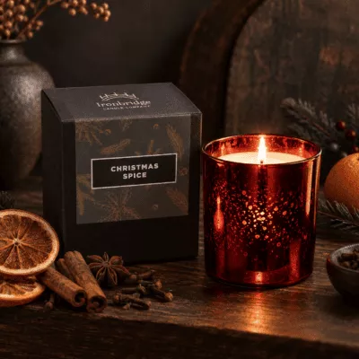 Christmas Spice Luxury Candle in ruby electroplated glass with branded box, dried orange, cinnamon, cloves and star anise.