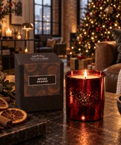Spiced Orange Luxury Scented Candle in a stunning electroplated ruby glass styled in an urban loft room in a Christmas Setting