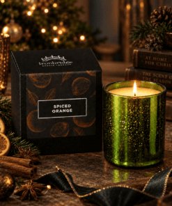 Spiced Orange Luxury Scented Candle in a stunning electroplated Emerald glass styled in a Christmas Setting