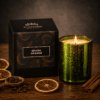 Spiced Orange Luxury Scented Candle in an Electroplated Emerald Glass - lit